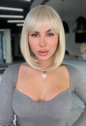 Synthetic women's wig 53201 HDW2140Q-TERMO (122) Blonde hair of medium length